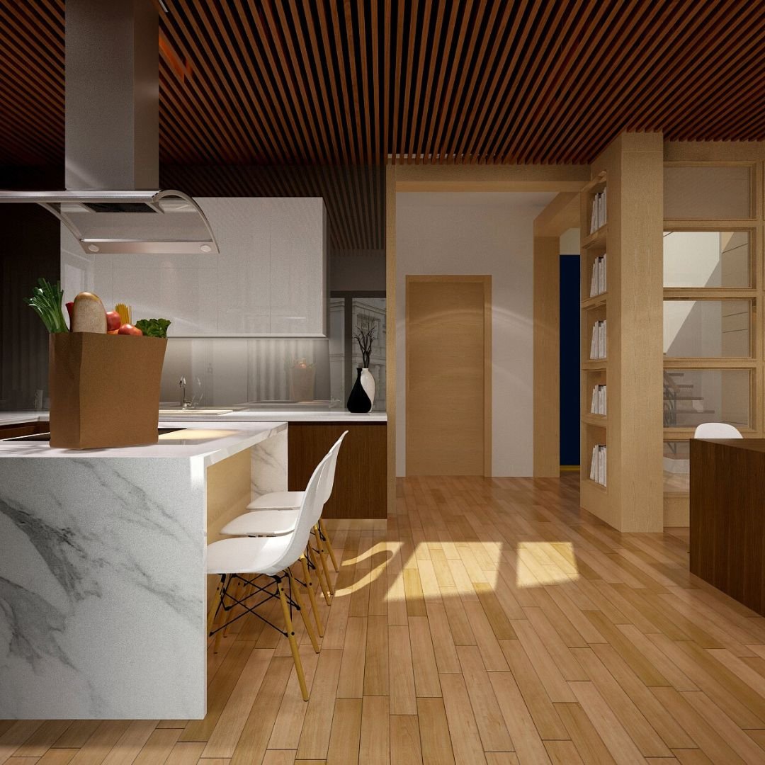 A kitchen with a marble island and a wood floor.